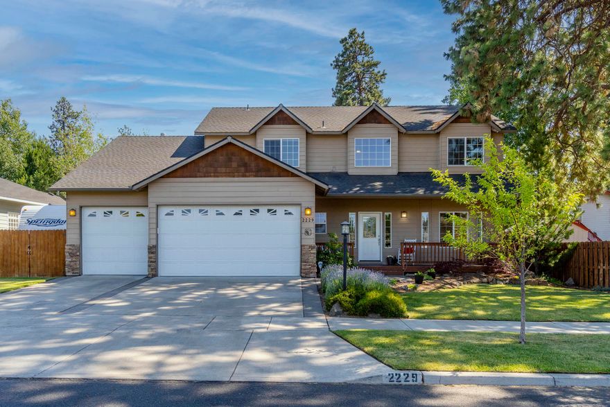 Looking for a 4 car garage+ RVParking?  Look no more! Living Rm w/ Bay Window has Views of Pilot Butte. Great Rm is Open to Dining Area & Kitchen w/ ''Walls of Glass'' overlooking the Spacious Completely Fenced Backyard while Enjoying the Ever Changing Seasons. Open Kitchen includes Double Oven, ' Microwave,  4 Burner Gas Cooktop,  Dishwasher, Cabinets Galore, Pendent Lights, Gleaming Oak Hardwood Floors & Breakfast Bar. Upstairs Master Suite is Separate from Guest Suites allowing Complete Privacy w/ Views of Pilot Butte, Ceiling Fan, Walk-in Closet, Dual Vanity, Separate Shower &  Jetted Tub. Laundry Rm is Upstairs for Convenience w/ Built-in Cabinets. Enjoy Outdoor Entertaining on your Back Patio w/ Lush Landscaping, Awning, Raised Beds, Productive Apple Tree, Trampoline, Swing Set & 2 Sheds (one stick built 12'X8' w/ loft & one 6'X4.5' plastic shed). This home has so much to offer!