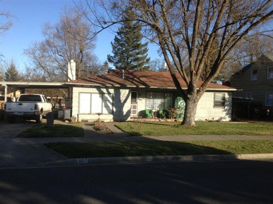 Rents total $1345.00 per month. Each unit is a two bedroom 1 bath. Has good rental history and is under professional management. A buyer may assume and or possibly modify the existing note held by the first lean holder which is a private party. Check with City of Medford regarding possibility of adding 3rd unit. This is a great project property for the handy person. Currently rented and need to give advance notice to show. Broker is related to Seller.