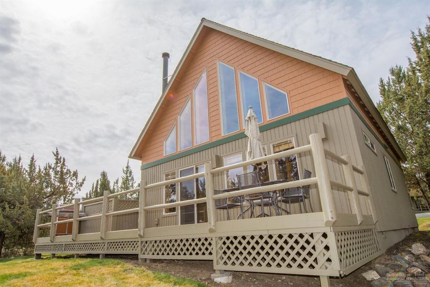Beautiful Chalet located on 17th green of The Ridge Course in Eagle Crest Resort! Pine paneling, gorgeous windows and hot tub on deck. Take in the beautiful surroundings from your deck overlooking The Ridge Course and views of Smith Rock. Accommodate a large group. Enjoy 5 weeks of resort life with 3 golf courses, a putting course, 3 sports centers, tennis & pickleball, day spa, and miles of trails. Can be rented, exchanged, loaned or used for your own enjoyment.