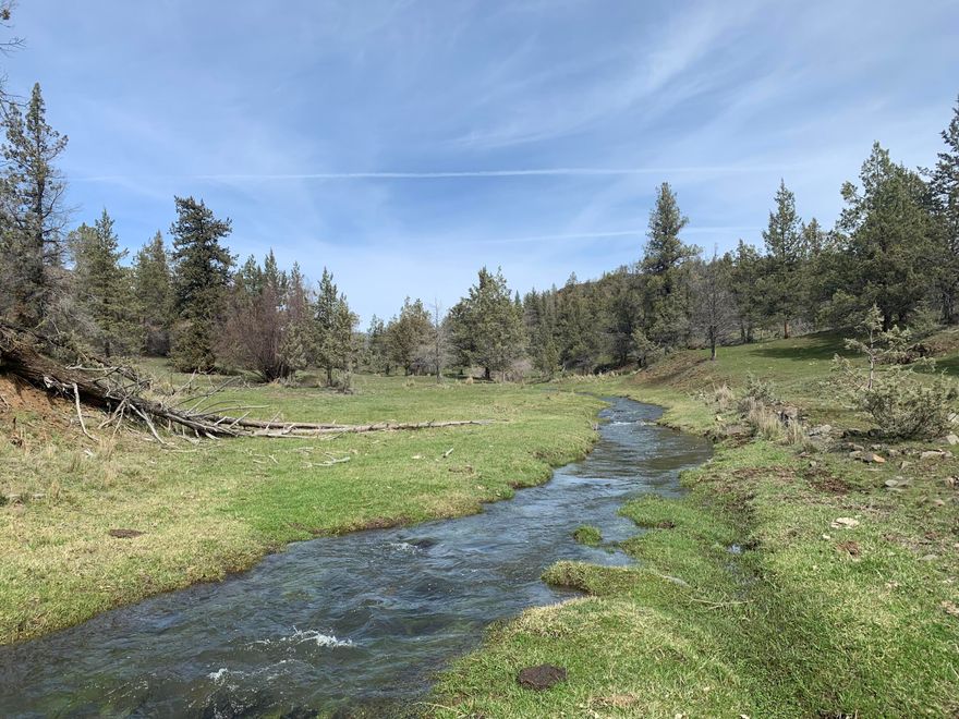 This contiguous 1507 acre ranch is located just north of Spray, Oregon & only moments from the John Day River. There is a ranch house, small shop w/ 220 power, storage building & a nice livestock barn. Approx 3/4 of a mile of Kahler Creek, a year round stream, runs through the NW portion of the ranch as well as several springs, one that feeds a year round pond near the house. The ranch has good roads throughout & many beautiful view sites overlooking the John Day River & the town of Spray. The grazing is currently leased to a local rancher that is running about 100 pair during the grazing season. With its location in the Fossil unit & proximity to the John Day River, it offers very good hunting for deer, elk, turkey, etc. The ranch qualifies for 3 LOP tags for elk & 3 for deer. The house is about 2 miles north of Spray & the John Day River which offer fantastic fishing. If you're looking for a getaway, hunting/fishing retreat or to add to your cattle grazing, this ranch is a must see.