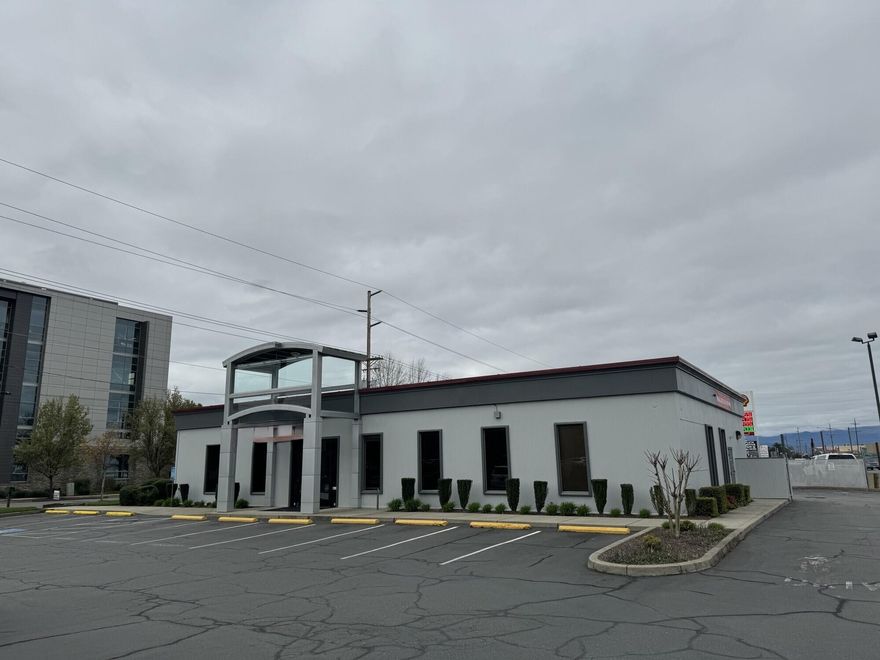 Tremendous HIGH traffic building on Redwood Highway with drive-thru lanes - now available! Approximately 3,648 SF building on an 0.62 acre lot. Former Rogue Credit Union branch building that has been meticulously upkept. Property includes a huge electronic monument sign and is situated prominently between Redwood Highway and Union Avenue. there are three drive-thru lanes and 28 parking spaces.