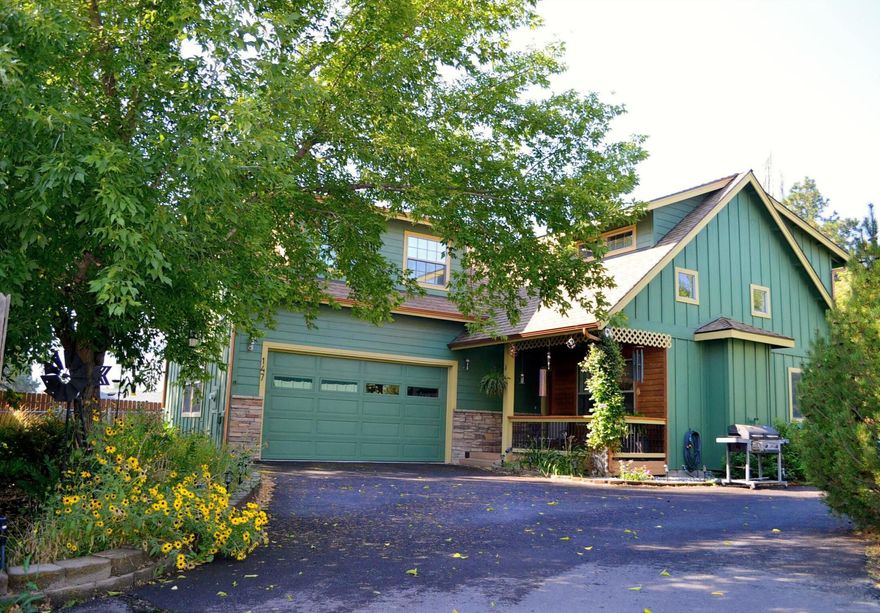 Your own private Oasis!  Situated on .13 acre at the end of a private road this 2,134 sq. ft. 4 bed, 2.5 bath home has been well cared for and offers privacy and comfort with lots of interior space.  The main floor features the primary bedroom with walk-in shower in primary bathroom, walk- in closet and sliding glass door for access to the private back deck.  Main floor has vaulted ceiling in great room and 1/2 bath for guests, dining area and kitchen with updated appliances.  The second floor features 3 bedrooms ( (the large 4th bedroom is currently being used as a family retreat room). The exterior of the home has a sweet covered front deck, full length rear deck and is completely fenced.  Raised bed garden area is fenced and gated.  Easy to care for home that is close to the heart of town for shopping and dining convenience.