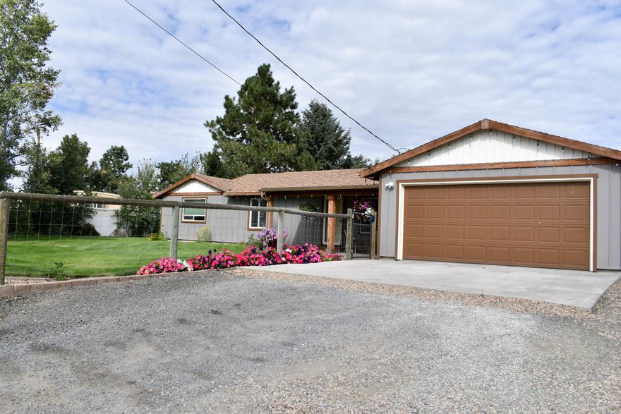 Lovely country setting with mountain views. This upgraded home features 3 bedroom, 2 bath, tile throughout, fresh paint, 2 living spaces, open kitchen to dining area, new appliances and soaking tub in the master bathroom. Great property for horses and animals with cross fencing and large shop. Covered front and back patios with French doors, wonderful for entertaining. Property is fully fenced with landscaping, garden area and sprinkler system. Enjoy the Central Oregon lifestyle with room for your toys and only minutes from town.