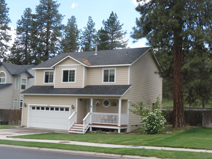 Nice four bedroom (inc master suite), 2 bath up and great room living down. Kitchen with island. Nice updates. Laundry upstairs and guest half bath down. New click it laminate floors and freshly painted inside. Large lefel fenced yard, backs to wooded open space behind. Raised garden beds. Underground sprinklers front and back. Near kids park and trails/ open space for hiking/walking dog. 8 min to town and base, yet woodsy feeling neighborhood. Won't last long.