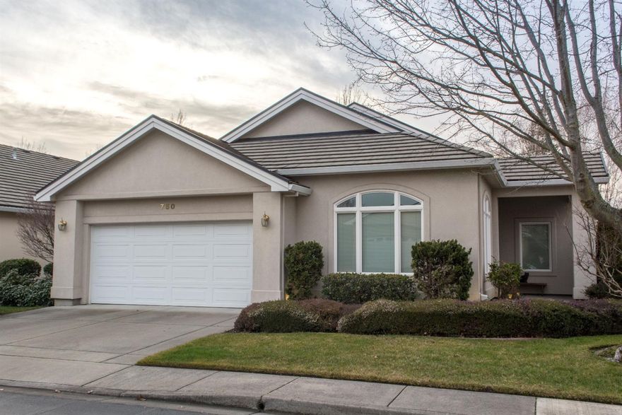 Located on the gated side of Alder Creek, this home stands out for its generous square footage and great floorplan. It's been lovingly cared for and is virtually immaculate. You'll appreciate the thoughtful design details like well-placed skylights, rich hardwood floors, and undermount lighting in the kitchen. Move-in ready and located near grocery, boutiques, and restaurants. And it's only 5 minutes from both Centennial Golf Course and The Rogue Valley Country Club!