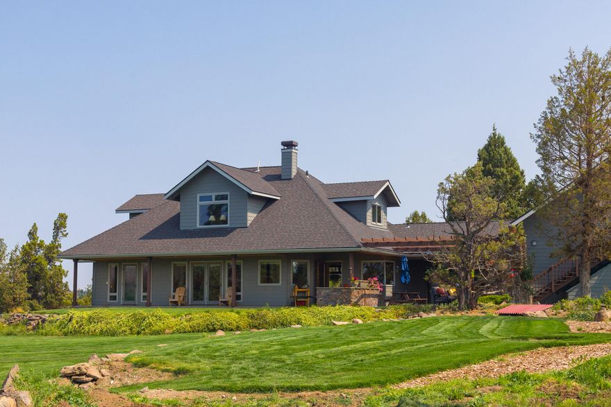 This spectacular one-of-a-kind farm, ranch or hobby farm with 7-peak Cascade views will capture your imagination. A private asphalt lane wends its way thru 34 lush, manicured acres fed by 28 ac COI-irrigation, perimeter- & cross-fenced. You'll find a hay loft (24x48'), shop (36x36'), stables & farm buildings along the way. The gardens, orchard & lawns above surround the delightfully remodeled 3,088 SF home featuring an open floor plan, gourmet kitchen, a Danish RAIS wood-burning fireplace, radiant floor heat, dining, library, master down. Breathtaking mountain views are visible from every room. An extended paver patio w/fireplace, pizza oven & barbecue offers a special entertaining venue. The detached 720 SF guest house is fully self-contained. Property is in Central Oregon's 'golden triangle' with Bend, Redmond & Sisters within easy reach. Great income-producing potential, mindfully cultivated to accommodate a lifestyle of self-sufficiency. An open canvas awaits your creativity.