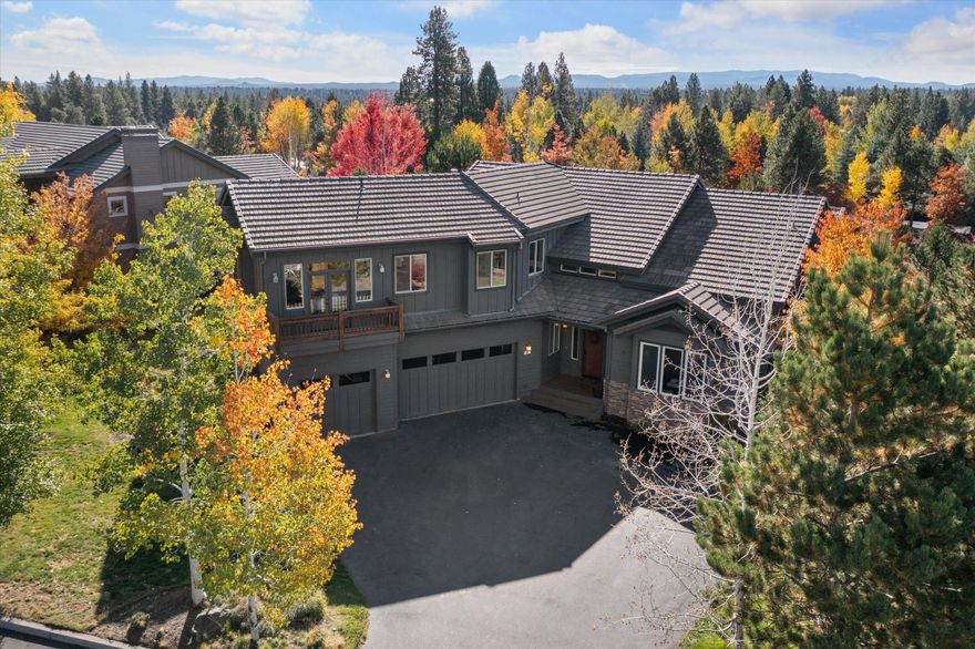 This thoughtfully designed 4-bedroom residence, with a dedicated office and a versatile bonus room is located on a large .37 acre lot in the heart of the westside.  Step inside and you immediately experience the grandeur and spaciousness of the soaring vaulted ceilings and the abundant natural light pouring through the expansive windows.  A floor to ceiling rock fireplace sets the ambiance for cozy gatherings. The updated kitchen features white cabinetry, stainless steel appliances, a convenient corner pantry, and a breakfast bar perfect for hosting friends and family.  The primary suite, with access to the back deck and backyard, and the home office are located on the main level.  Ascend the staircase to find three additional bedrooms and a versatile bonus room, offering ample space for relaxation and recreation. The 3-car garage will accommodate all your Central Oregon gear and a generous flat driveway provides ample parking space.