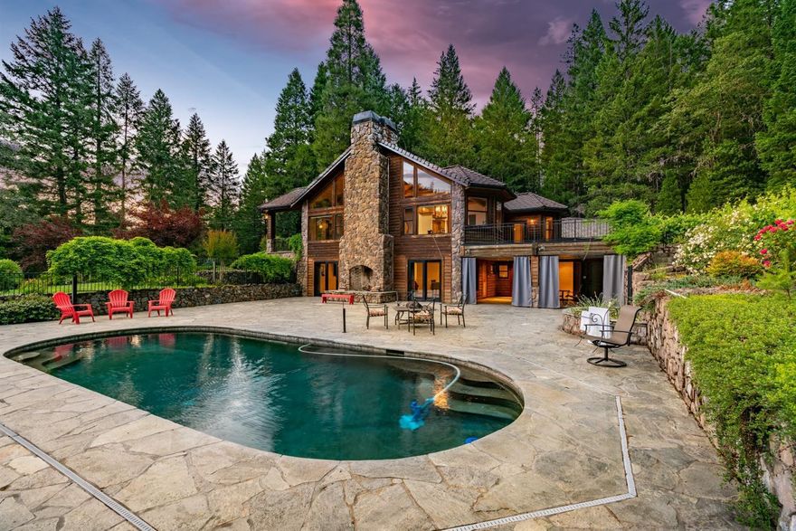 Welcome to Elliot Creek Estate where you will find country luxury at its finest. Located in beautiful Southern Oregon, the stunning forest & meadow setting offers privacy while being close to town. The year-round creek, pond & adjacent BLM lands provide abundant opportunities for recreation, & pleasure. The luxurious multi story home includes all the amenities, exquisite craftsmanship throughout, stately lodge style finishes & a great floor plan for entertaining. Expansive windows show off the stunning grounds & mountain setting. Large beams, vaulted wood ceilings, wood floors, multiple rock fire places & knotty alder finishes all contribute to the mountain lodge feel of this home. Set up on two levels this home provides two wonderful spaces for entertaining & relaxing with friends & family. Also featured is a detached - guest quarters/office, in ground heated pool, elegantly appointed outdoor entertainment areas, barn, covered riding arena, shop & numerous outbuildings.