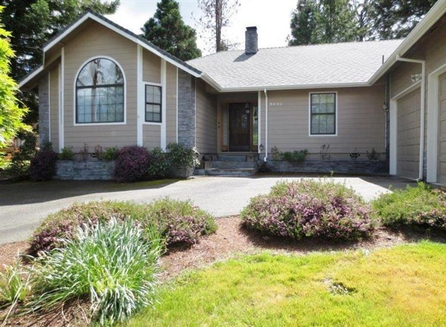 Beautiful custom built Good Sense home featuring 3 bedrooms, 2 baths with 2488 sf.; built in 1992. Great room with large picture windows to enjoy the mountain views and let the sun shine in. Kitchen is a cook's delight with Jenn-Aire appliances, skylight, breakfast nook an abundance of cabinets and counter space. Family room with wood burning floor to ceiling slate fireplace and slider to the deck. Spacious master suite with French doors, dual sinks and jetted tub. This will be your own spa get-away. You will love the vaulted ceilings, sound system, central vacuum, ceiling fans and garden windows. An attached two car garage with lots of storage and a golf cart garage. Golf enthusiasts will love the proximity to the GOLF COURSE. Gorgeous low maintenance mature landscaping with sprinklers and drip; back yard is fenced and a patio for relaxing with that morning cup of coffee. Great location close to shopping, hospital and golf course. Seller has installed a 2,000 gallon holding tank.