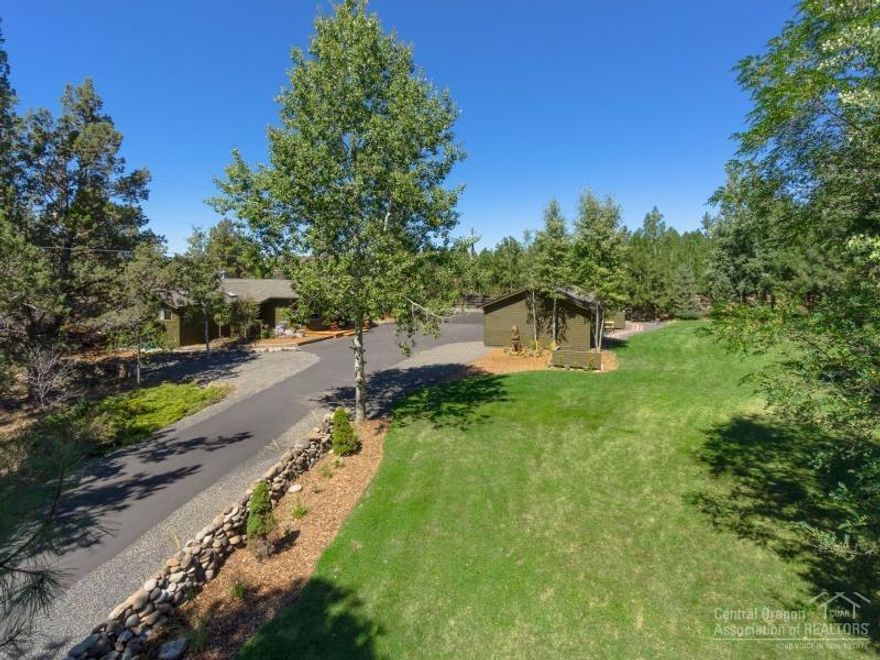 Private, one-of-a-kind Tumalo acreage with irrigation, river frontage & Cascade Mountain views. All on a single level enjoy a fresh remodel on this ranch style home. Updates include a new kitchen, oversized 2 car garage, fire place, dining & family area, exterior paint & deck stain & a new septic system. Additional building include guest house (2 bdr/2 bath), a separate artist's studio. Other highlights are a hot tub, gated entry, &RV hook-up. Truly a unique opportunity!