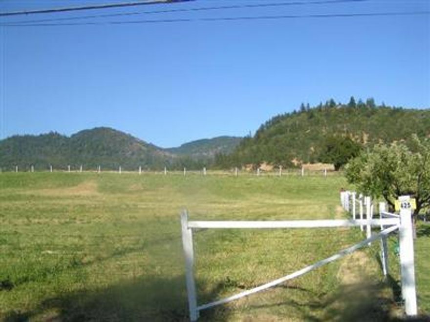 Located just A Whisper From The Convenient East Side Of Grants Pass, This Beautiful 1 Acre Building Lot Is Perfect For Your Dream Home! This Property Includes Irrigated Pasture Framed By A Hillside Backdrop, Good Surrounding Wells, Septic Approval &