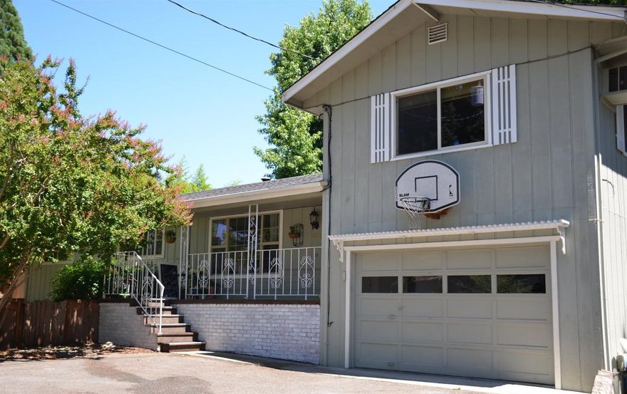 Adorable 3 bedroom 2 bath home with a fenced yard and a side door into the garage that enters into a separate small room. In 2014 beautiful hardwood floor put thru most of the house and into the large living room a couple steps above main floor. In 2015 a new roof was installed.