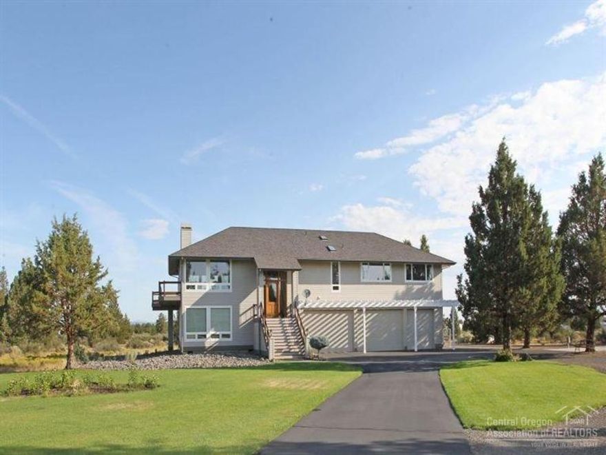 Exquisite 10 peak Cascade Mt view from this private 10 ac beautifully landscaped and easy care property. Open Great Room with gourmet kitchen w/ a view from every window. Large Master bdrm and bath, walk in closets. Generous Bonus Room with wet bar and bath. Separate studio/guest home with private bath. Paved st and driveway, securely fenced and gated, large paved RV parking space with power. Located between Bend and Sisters. Very generous room sizes,reverse living. Ready to move in in great condition!