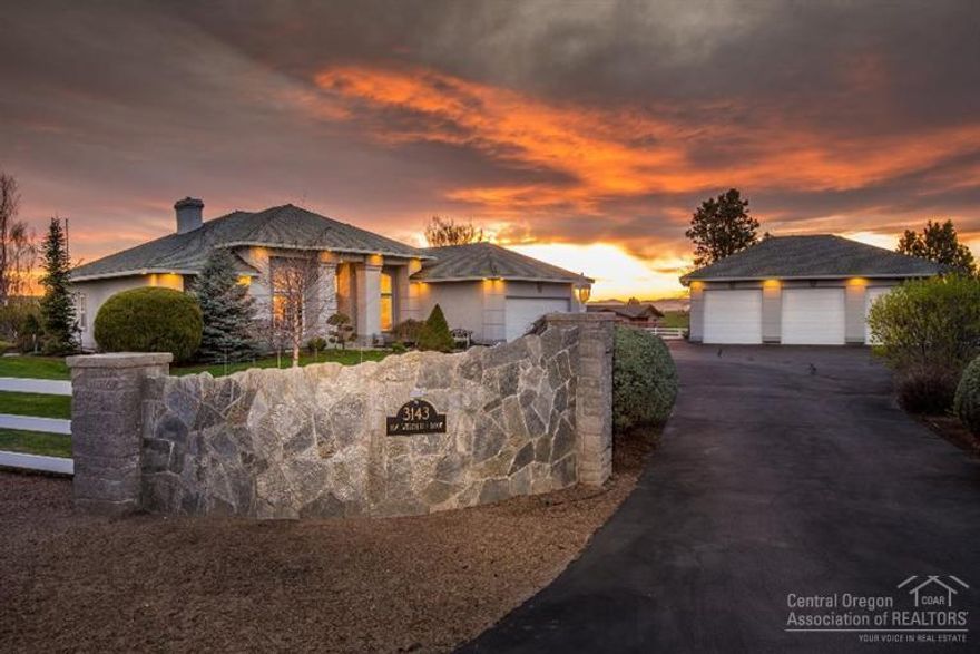 Classy stucco home on 1.92 AC in West Hills. Stone entry w/paved drive leads to beautiful private irrigated oasis. 3bd,2ba + office/den. French doors to L/R, formal D/R, breakfast nook w/butlers station. Cooks dream kitchen w/cherry wood appointments, rotating pantry &spacious counters. Split floor plan, master suite w/patio access to hot tub. Meticulously manicured back yard, stamped concrete patio w arborvitae and vinyl fencing to create a tranquil setting. 1220sf garage/shop.