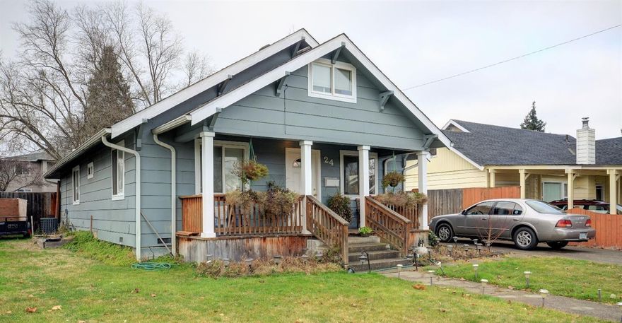 Two story Craftsman Style house with a welcoming front porch. 1696 sq ft 3 bedroom/2 bath house that was completely remodeled to the studs in 2005. Two bedrooms with nice sized closets and 2 full baths are downstairs. Upstairs is the third bedroom and bonus area that could be an office or den. Comfortable living space with plenty of windows, ceiling fans and new wood laminate flooring. Kitchen has a lot of cupboard and counter space, as well as a large walk in pantry. Indoor laundry is at the back of the house with a slider to the backyard and the over sized single car garage. Back yard is completely fenced with alley access through a locked gate.
