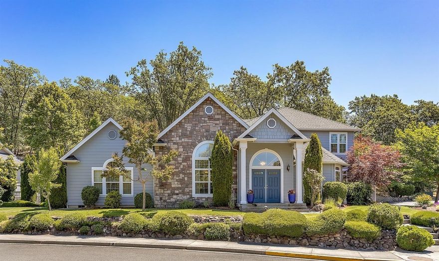 Beautifully maintained in an immaculate neighborhood of comparable homes on the fringe of town, this home has a light & bright great room floor plan with backyard sanctuary and RV garage! Wood floors through-out vaulted living room w/gas fireplace. Chef's kitchen with 5-burner cook-top, convection oven, granite breakfast bar, porcelain farm sink, lighted glass cabinet doors & soft close drawers with hidden'' subdrawers! Covered back patio is perfect place to enjoy privacy & solitude of this sanctuary landscaped with fenced lawn, raised garden beds and ornamental trees, flowers & plants among terraced stacked block walls. Spacious master and bath w/jetted tub, step-in shower & huge walk-in closet. Formal dining with wainscot walls under trayed ceiling. Upstairs TV/family room with two additional bedrooms each with walk-in closets big enough to be called an office. But it is the attached RV garage with hook-ups, epoxy coated floors & mechanics closet that separates this from the rest!