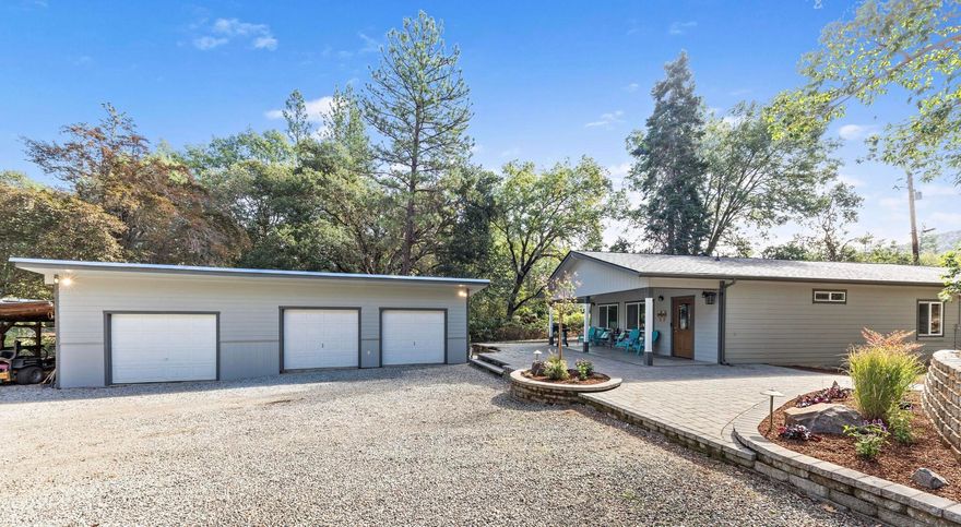 Dream of sitting on your oversized front porch? Tucked just off iconic Old Stage Rd, in a Firewise
Community is a gated 3 bed, 2 bath retreat with a 3-car detached garage/shop. Recent updates include
a gorgeous new paver patio and new LVP flooring and fixtures. The primary suite offers a walk-in
closet and built-ins. The fully fenced property offers space for RVs, toys, or animals, plus multiple
outbuildings: a 1-car carport, well house with 1,500-gal tank, and an additional structure with 2,500-
gal potable/irrigation tank. The garage/shop is temp-controlled with hot/cold water—check with the
county for possible ADU conversion- buyer to perform their own due diligence. A versatile property ready for its next chapter! 1 Year Home Warranty offered to buyer.
