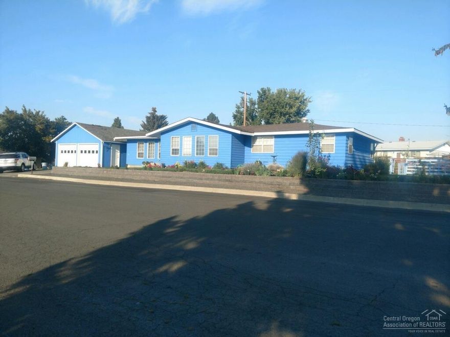 Well kept home in a peaceful, quiet neighborhood. Amazing neighbors. Natural light throughout with lots of windows. Plenty of room in this 1947 square foot home. 3 bedroom 1.5 bath (new toilet), huge living room and den, craft/hobby room (has its own entrance with a new lock). Large kitchen with lots of storage and a new dishwasher. Views of Mt. Jefferson. Detached 2 car garage with a shop. Extra storage shed.