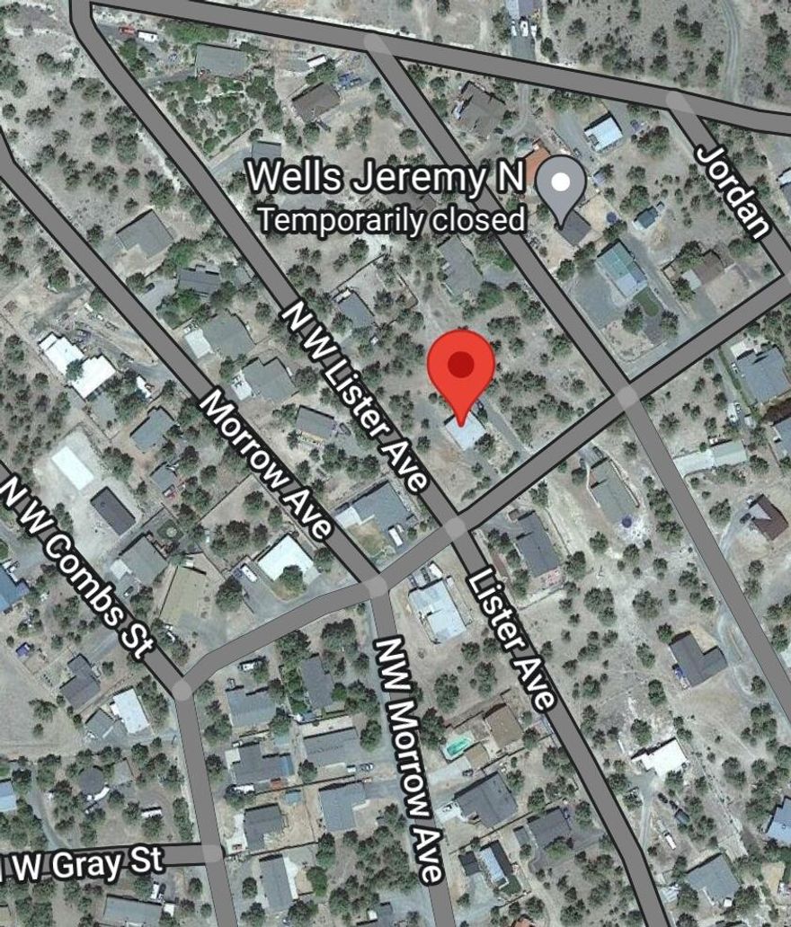 Great investment or starter home. Charming inside and out this 2 bedroom and 1 bath home, on 2 lots. Big deck with nice mountain views.  Enjoy all the amenities of Ochoco West: Community clubhouse, swimming pool in summer, fishing lake and stables for a fee. 100's of acres of BLM land for recreational use and close to all Central Oregon has to offer.