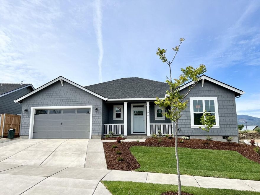 Built in 2022 in a beautiful country setting in Medford area with views of surrounding mountains nearby! An exceptional quality builder that we've grown to love in the 
valley throughout the years is what you get when you purchase a home built by Pacific Trend Building Company. A stunning craftsman styled home with approximately
2001 sq ft, 3 bedrooms, 2 full baths and 3 car tandem garage! Features an open kitchen with beautiful granite counters including gorgeous high end light fixtures and tiled fireplace. Custom cabinets are birch and alder with the highest quality in the industry. Luxury hardwood flooring in entry, kitchen, living room and hallways. Bathrooms and laundry include tile flooring. Professional landscaping in front and back round out this home. Estimated completion date June 2022. Other lot and home packages available! Listing agent is related to Seller. Pictures are for illustration purposes only.