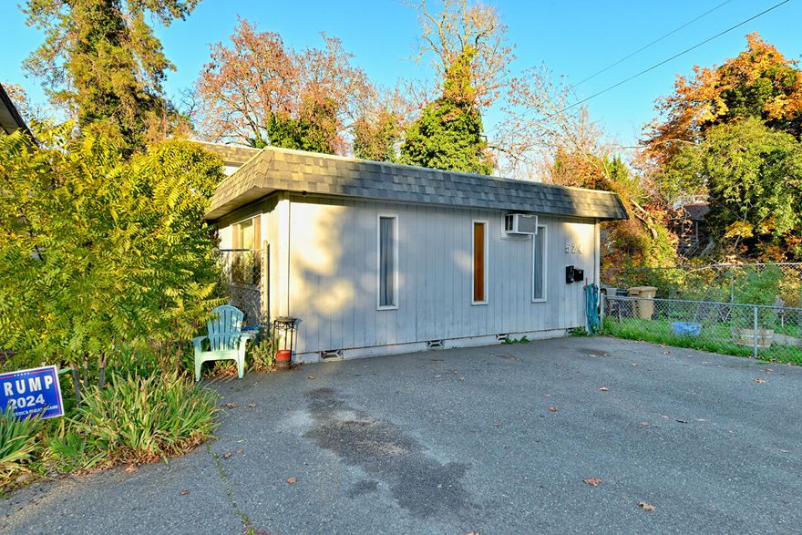 Back on market due to no fault of property! Charming duplex in a highly desirable northwest Grants Pass pocket—close to everything, yet tucked into a calm, convenient neighborhood. The front unit offers single-level living with 2 bedrooms and 1 bath, while the back unit gives you a roomy two-story layout with the kitchen and living space downstairs and two generous bedrooms plus a full bath upstairs.