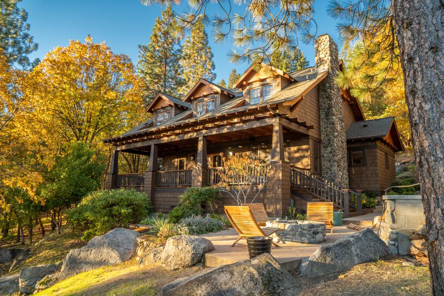 A property like this doesn't come along often. An incredible 2798 sq. ft custom Craftsman style home, with a 480 sq.ft guest studio above the garage, all on 1.68 acres just 3 blocks from downtown Ashland! Everything in this home has top of the line features from the light fixtures to the rift and quarter sawn white oak floors. Classic Craftsman woodwork and cabinetry throughout the home. Formal entry with grand staircase leads to the open main living area with a gorgeous river rock fireplace. French doors open to the large deck overlooking the trees and Grizzly Peak. The gourmet kitchen has cherry cabinets, soft close drawers, cut rock granite, Sub-Zero frig, Viking stove & oven. Main level primary suite includes heated tile floors, clawfoot tub, dual shower heads & walk in closet. 2 large bedrooms upstairs share a cozy landing. Beautiful hardscaping surrounds the outdoor kitchen, patio with river rock fire pit and private park like setting. New roof in 11/2021, HVAC's in 2020/21.