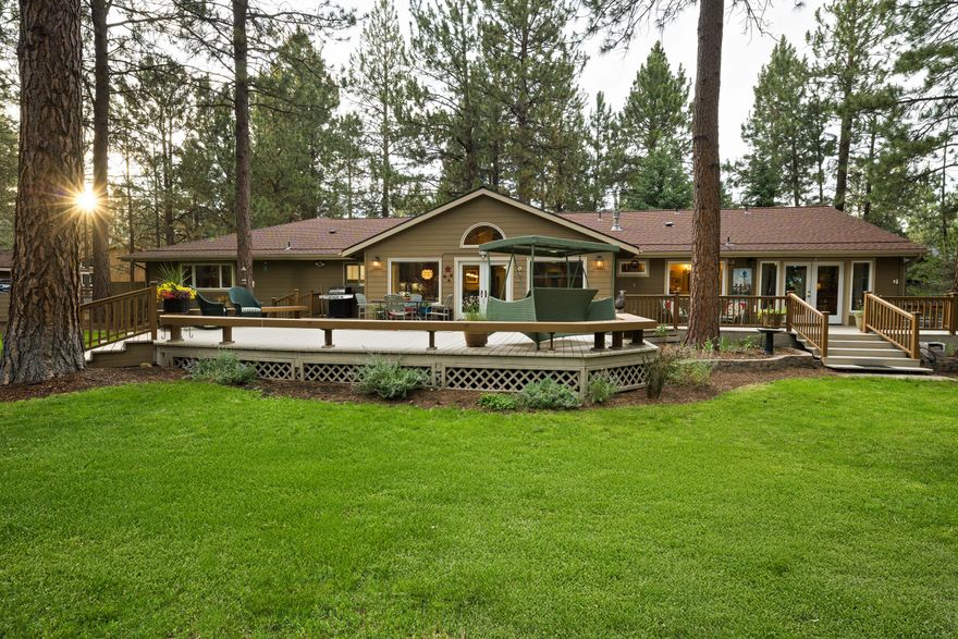 NEW PRICE ALERT! Act now to secure this move-in-ready home in coveted Tollgate, Sisters, Oregon. Option to purchase furnished and be home for the holidays! Meticulously maintained single-level 2,352 SF home features an open floor plan with a vaulted great room and natural light.  private 0.72-acre lot bordering open space and a private ranch with nearby access to forest trails. The interior features a great room, 3 bedrooms, 2.5 bathrooms, a dedicated flex/craft room, and a reading room/library/office. Extensively remodeled with a new roof in 2017. The property is fully fenced and cross-fenced with a remote-operated gate. The private backyard oasis has a large deck, lush lawn, mature plants, and a greenhouse with raised garden beds. Ample storage and parking: 3-car garage, side yard storage, plus two storage sheds. Tollgate amenities include a saltwater pool, playground, sports courts, and more. 2 miles from shops, restaurants, and schools in charming downtown Sisters, Oregon.