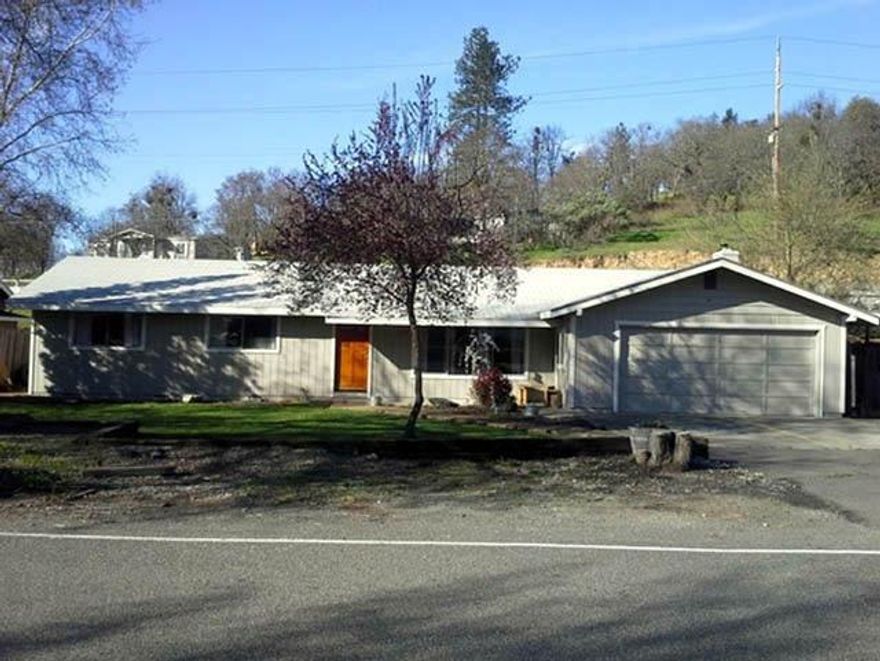 Solid 2080 sq ft. Ranch-style home on .23 of an acre, city schools, 3 bedrooms, 2 full baths, split layout with good flow, living room, kitchen and family room, plus 2 bonus rooms, could be used as additional bedrooms or craft/hobby room and office. 5 ton A/C! Heat pump, tile walk-in shower (handicap friendly bathroom), jetted tub in master, ceiling fans in every bedroom, some solid core doors, some laminate wood flooring. New insulation in attic and crawlspace, new water heater, new liner in fireplace. Fully fenced back-yard with barn-style insulated shop with 220, concrete patio for entertaining, and established fenced in garden. Fantastic location minutes from shopping, Cathedral hills hiking trails, and schools. Seller already had home inspections performed. FHA-financeable and at this list price of $199,000 - Seller will offer a credit of $7000 to Buyer for a new roof because current roof has about 3 years left. Well water, city sewer, quite cul-de-sac neighborhood.