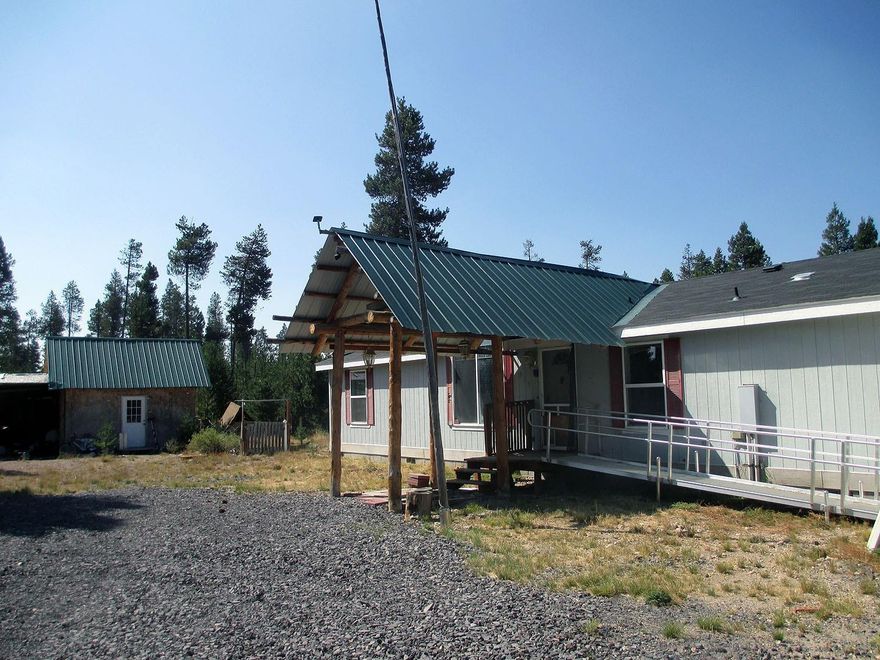 This is three adjoining Tax lots in a beautiful secluded wooded area of Chiloquin. The triple wide manufactured home was built in 2004. Dual pane vinyl windows, vaulted ceilings, Maytag appliances and forced air central heating. Several outbuildings for storage.This is in a beautiful secluded wooded area. Plenty of privacy, if you desire , or new owner could decide to harvest the vast amount of trees. Located off Hwy 97 and close to Chiloquin.