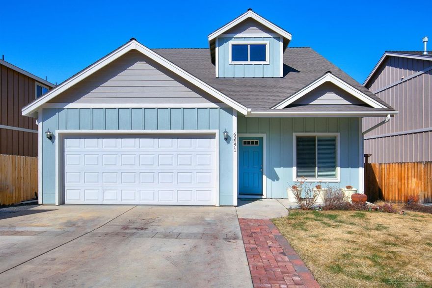 Craftsman style home in NE Bend with fenced yard. Home is 1705 sq ft, 3 bedrooms, 2.5 bathrooms, main floor living, master on main, kitchen with island, tile counter tops, dining area, living room, family room, utility room, attached 2 car garage. Home features natural gas and central air conditioning. Out door living includes a great deck, hot tub, fire pit and yard with a sprinkler system. Close to Pilot Butte