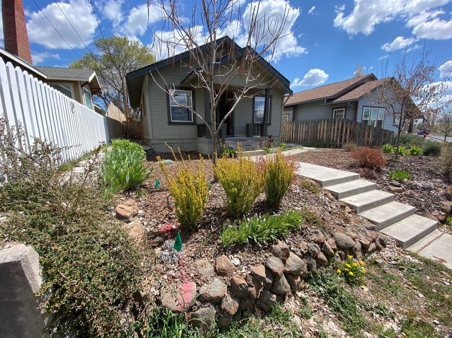Oh my gosh this too cute home has many upgrades and is ready for you. This is a two bedroom geothermal home with lots of built ins, hardwood flooring, vinyl windows, Nice fenced back yard. Access through alley to carport with shed.