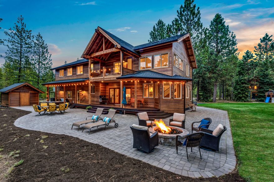 Just minutes from the westside of Bend, this peaceful sanctuary provides 4181sf of living spaces for relaxing, entertaining and enjoying the views and sounds of Tumalo Creek in this park-like setting. The 3401sf main home has an airy great room with natural light, open kitchen, wet bar, wood stove and large doors that open to a covered deck and expansive paver patio for seamless indoor-outdoor living. The primary suite has a private deck overlooking the creek. There is a secondary suite, bonus room and two additional bedrooms with a shared bath. The 835sf two-car garage has a 10ft overhead door and mudroom for staging outdoor adventures. A 780sf guest house/office has two additional garage bays, 1.5 baths, laundry and two decks. This artfully-designed retreat in a one-of-a-kind location is filled with majestic old-growth Ponderosas and has 283ft of private creek frontage. Bordering this Deschutes National Forest, this is a dream property for people who love privacy and the outdoors.