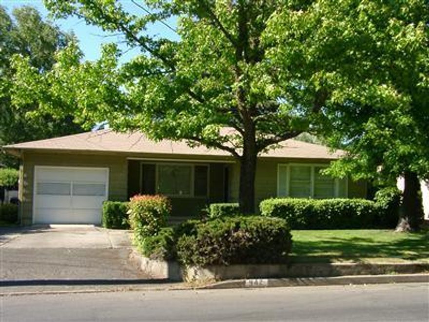 Great Investment Or Starter'' Reduce your monthly payment by living in one and renting the other! House #1 is a solid 2 bedroom, 1 bath 1066 SF with hardwood floors, fireplace, dining room, covered front porch and rear patio, garage with shelving and will rent for $725 p/mo. House #2 is 1 bedroom, 1 bath 541 SF with big kitchen, new tile shower, private front and rear yards with fruit trees and could rent for $425 p/mo. Bigger house has new interior paint. Each has their own yards. Owner/Broker