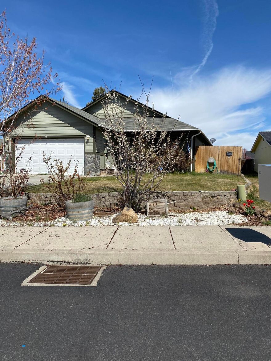 Cute single level home ready for your personal touches.  Nice sized lot with large deck.  Mtn views from the front yard and peek a boo view of Black Butte from the backyard.
Great starter home or a solid choice for a downsize home or great investment as a rental property. 
See it quickly, vacant, text listing agent and go show.