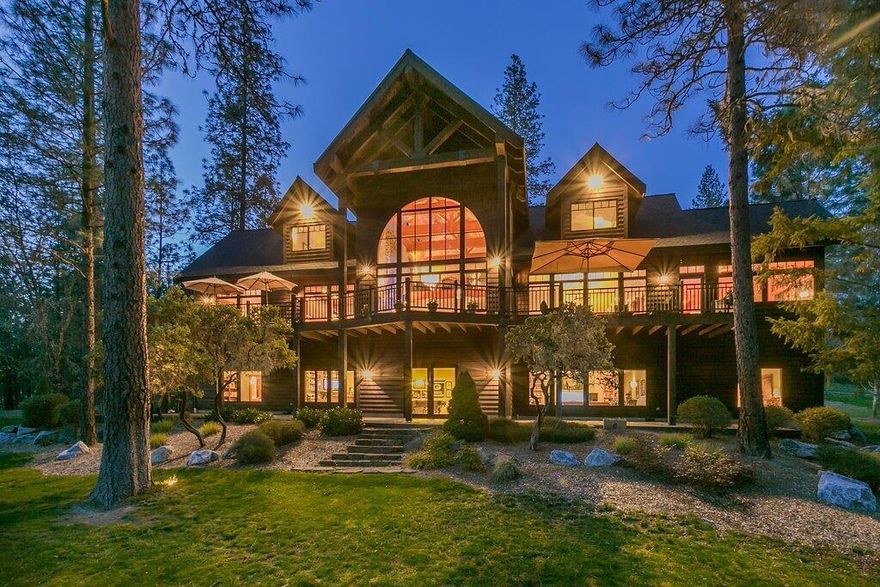 This custom-built, luxury, lodge style home providing privacy, expansive open floor plan, smart home technology, and security sits on a park-like setting of 9.99 acres in beautiful Southern Oregon. Energy efficient geothermal heating/cooling continues throughout the vaulted great room, gourmet kitchen, en-suite master bedroom, home office, and lower level media/entertainment area. Designed to bring nature inside, this home offers views from every room. Outdoor-living is featured by a BBQ room, wrap-around deck, spa, shuffleboard court, picnic area, and landscape lighting. CHECK IT OUT WITH a 3-D VIRTUAL TOUR at this WEBSITE: 185pleasantvilleway.com. ''A picture is worth a thousand words!'' Property includes additional buildable tax lot