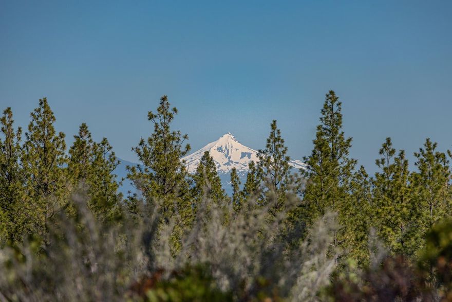Welcome to Lot 4 in Westgate, where the ultimate Pacific Northwest lifestyle awaits. At just under 5 acres, this stunning lot is one of the largest in Westgate and offers an incredible opportunity to build your dream home amidst a breathtaking natural landscape. The combination of towering trees and expansive vistas creates a  unique opportunity to wake up to the tranquil sounds of nature from the comfort of your own backyard. This spectacular homesite has a gentle downward slope to the North, allowing for great single-level living while benefiting from a slightly perched vantage point from the back of the future home. With trail access to Shevlin Park nearly out your door and the dining and shops of Bend's Westside a short ride away, this is the perfect blend of natural beauty and urban convenience. Don't miss your chance to make this stunning property your own where you can build the custom home you've always dreamed of in a location unlike anywhere else in Bend.