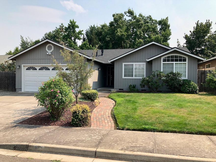 Immaculate single-level home with beautiful oasis backyard. Built in 1992, this super clean home with 3 bedrooms and 2 bathrooms has been above and beyond lovingly cared for with upgrades such as a new roof, new HVAC system and new exterior paint. The private oasis backyard with water feature, mature trees and new fence is accessible from dining room & master suite. The grand room features a fireplace and vaulted ceilings. There are granite countertops, ceiling fans, double-paned windows and lots of light throughout. The master suite has coffered ceilings, large walk-in closet and en-suite bathroom with jetted tub/shower. This is a must see!