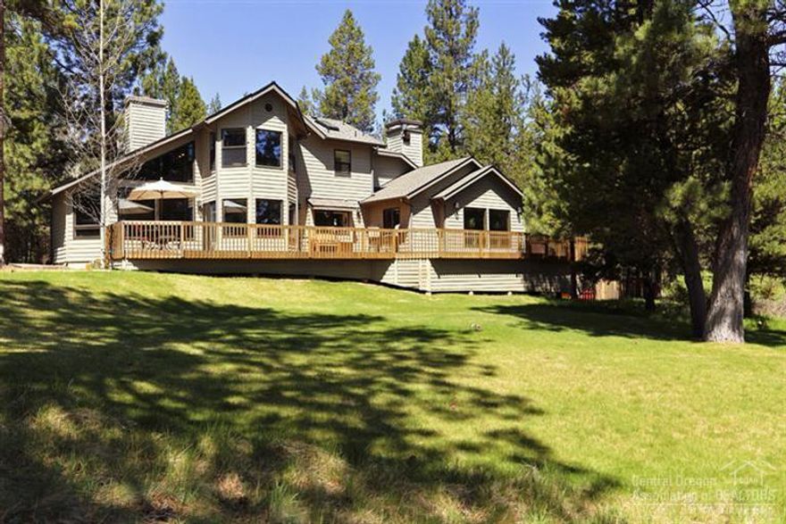 Picture yourself here! Approx. 200' of Deschutes River frontage, private dock offers easy access for kayaking, swimming, fishing & relaxing. Just over 1 acre of privacy & a gorgeous setting. Fabulous home w/high ceilings, open beams, skylights, maple floors, tile floors, open living & dining area w/over sized river rock FP, 2 master suites, main level w/cozy wood stove & access to spa, upper level w/gas fireplace, both w/amazing river views! All appliances, Hot Spring Spa & home warranty included.