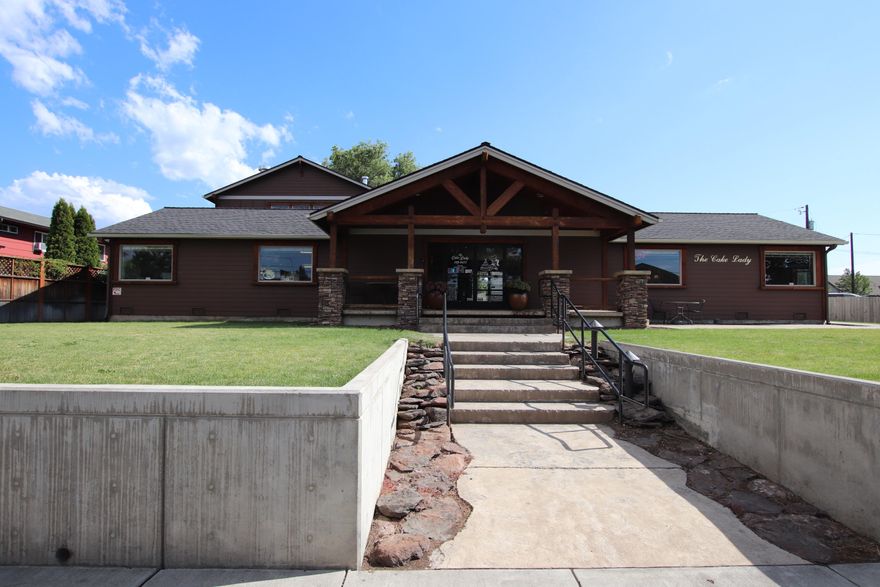 This is a high-end building centrally located off of 3rd Street. The property is in first class condition after a complete building remodel in 2009 which included beautiful beam construction made from trees hand selected by the owners.

This facility is perfectly set up for a bakery, small restaurant, medical/veterinary clinic, or office. The interior features a large cafe-style customer seating area and long serving counter. There is also outside seating with mountain views. The first floor has a large kitchen area which is set up as a bakery.  The second floor has a large open space with mountain views, suitable for storage, additional office space or residential apartment.