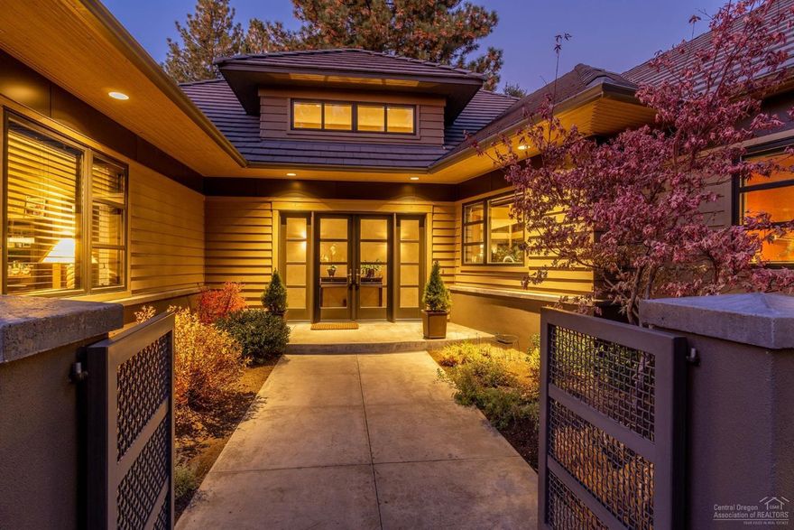 The contemporary design of this single level home has been created to transition from outdoors to indoors in a gradually revealing manner. A collaboration between the esteemed trio of architect Scott Gilbride, interior designer Kirsti Wolfe & master builder Greg Vendrame have combined in the creation of a home w/ an emphasis on the play of light, timeless architecture & design. Front courtyard leads to the interior, featuring a light filled great room overlooking Broken Top's 3rd green, tumbled steel fireplace facade w/ concrete mantle & hearth, walnut wood flooring flowing to dining defined by suspended soffit w/ steel posts, floating buffet & imported Italian light fixtures. International award-winning kitchen is optionally separated by metallic sheer drape integrated into ceiling. Office w/ mahogany desk, library shelving & rolling ladder. Spa patio is adjacent to Master Suite w/ dual closets, glass & concrete shower. Two guestrooms & baths w/ equally high-quality design & finish.