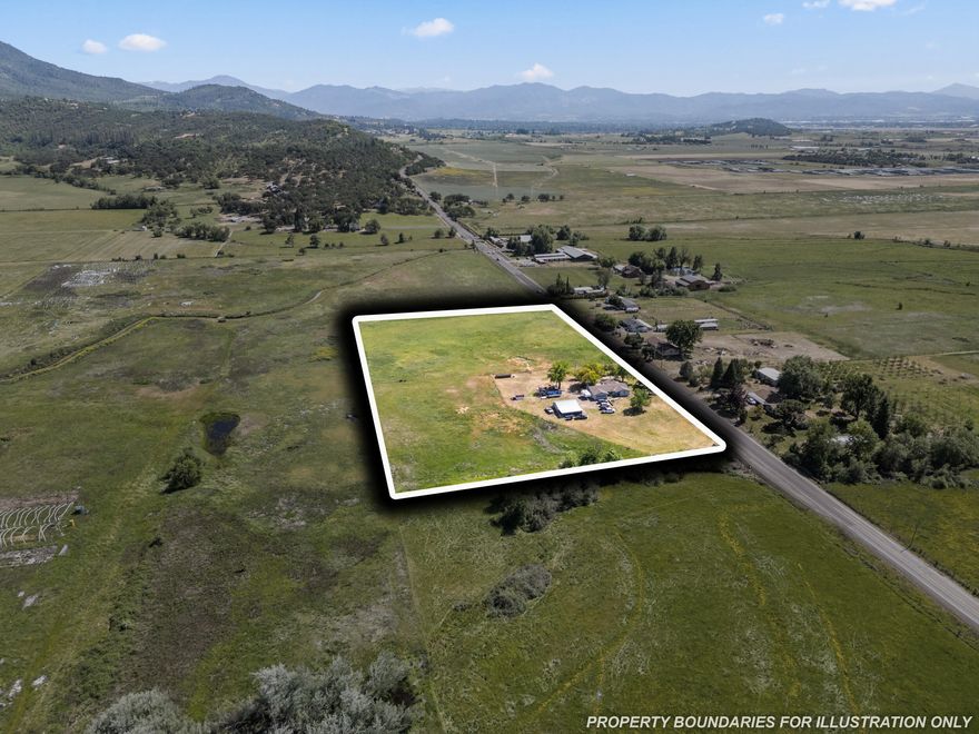 Ready to start your dream farm life? This nearly 8-acre EFU-zoned property with mountain views and Rogue River Valley irrigation rights offers the perfect blend of rural living and convenience, just 15 minutes from downtown Medford and the airport. The 1,790 sq ft, 3-bed, 2-bath ranch-style home features a spacious layout built for comfort and function, including an updated primary suite with a dual-head shower and walk-in closet. There's plenty of room for animals, gardens, RV/boat parking, and equipment, plus a detached workshop and an attached two-car garage. Whether you're dreaming of homesteading, raising animals, or simply stretching out under wide-open skies, this property is full of potential and ready for your vision. Bring your boots and imagination. This is the property you've been waiting for!