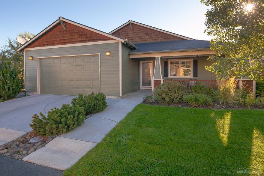 Picture perfect family home in NE Redmond inside AND out! Great room plan lives large w/vaulted ceilings, gas fire place, decorative plant shelf. Kitchen features central island & pencil glass accents, corner sink that looks out to gardens. Spacious Master Suite w/walk in closet & shower. Laundry w/cabinets & shelving for extra storage. Covered front entry & back patios. Huge back yard w/water feature, storage shed & space to entertain. Established landscape, sprinklers, fenced & pet/child ready!