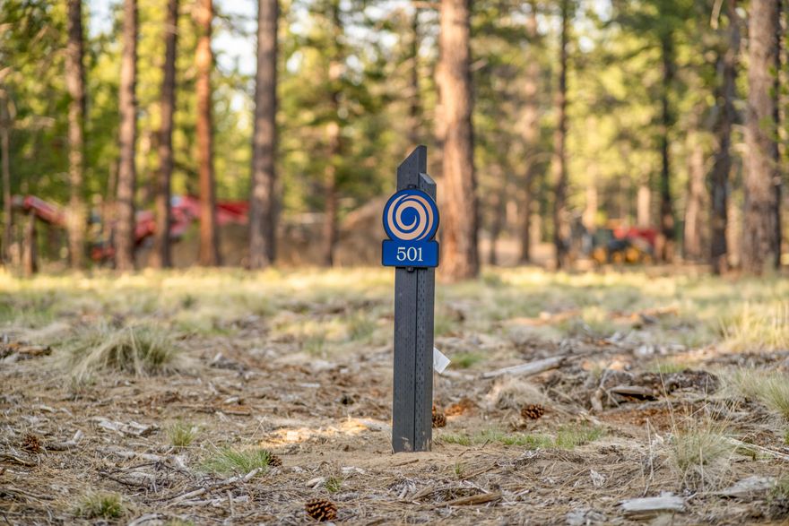 Introducing Wild Pine Homesites at Caldera Springs! Explore our newest neighborhood — where serene water views meet forested landscapes. Nestled in our scenic northern section, Wild Pine Homesites offer an unmatched opportunity to experience the coveted Caldera Springs lifestyle. Limited-time incentives include 5% off the list price and Developer paid HOA dues through December 31, 2026. Featured Homesite - Lot 501 is a peaceful .47 acre homesite, large enough to accomodate a 6 bedroom home, and backs to a picturesque pond and water features. Framed by towering pines and basking in year-round sun, this lot provides the perfect setting to design and build your custom dream home. Owners enjoy special access to the Forest House Amenity & Aquatic Center along with golf, fitness, pickle ball, tennis, pools, kayaks & paddle boards. Caldera Springs is located near Sunriver, just 15 minutes to Bend and 30 minutes to world class skiing at Mt. Bachelor. Taxes TBD.