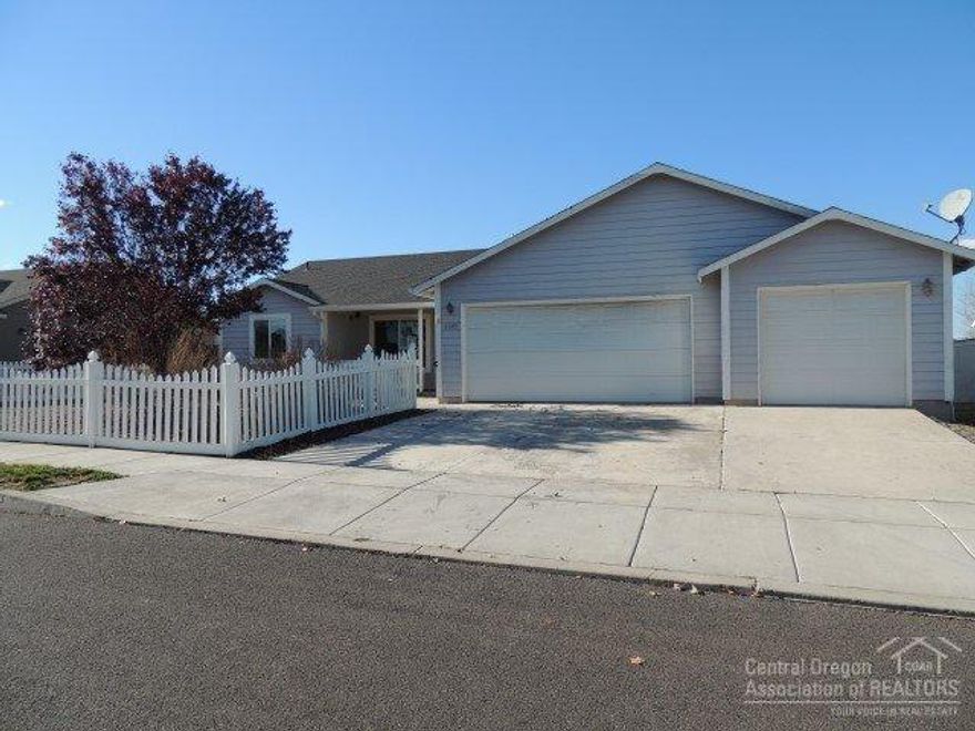 Looking for a white picket fenced front yard? Come and view this 3bd/2ba home. 1336 sf home with open floor plan. Master bedroom is located on opposite side of home for privacy which includes access to a covered patio off side of home. Dining area includes an access to another covered patio through sliding door. Fenced back yard which is waiting for your own designs.