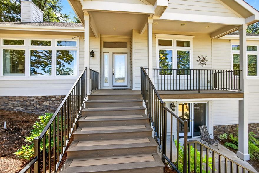 Beautiful home custom built by Scaglione Building & Development, offering privacy, breathtaking valley views & quality throughout. Located on a quiet street just blocks from downtown w/14 ac of Beekman woods & trails right out the front door. This stunning home features 3085 sqft of luxury living, upon entering you'll notice the Madagascar Hardwood floors, 10' ceilings, crown molding, lg custom windows, skylights, natural light & views! Spacious primary suite w/custom closet & views. Thoughtfully designed w/2nd driveway leading directly to main level-no stairs required! Gorgeous kitchen w/granite, pull-out drawers, SS appliances, coffee bar & breakfast nook opening to a peaceful covered patio & arbor. Dual-zone HVAC+ pellet stove for 2nd heat source. Tiled showers in all baths. Lower level offers flex space w/bar, separate guest/in-law suite w/private entrance. 3-car garage, RV pkg, new ext paint. A rare blend of luxury & tranquility just min from everything Jacksonville has to offer!