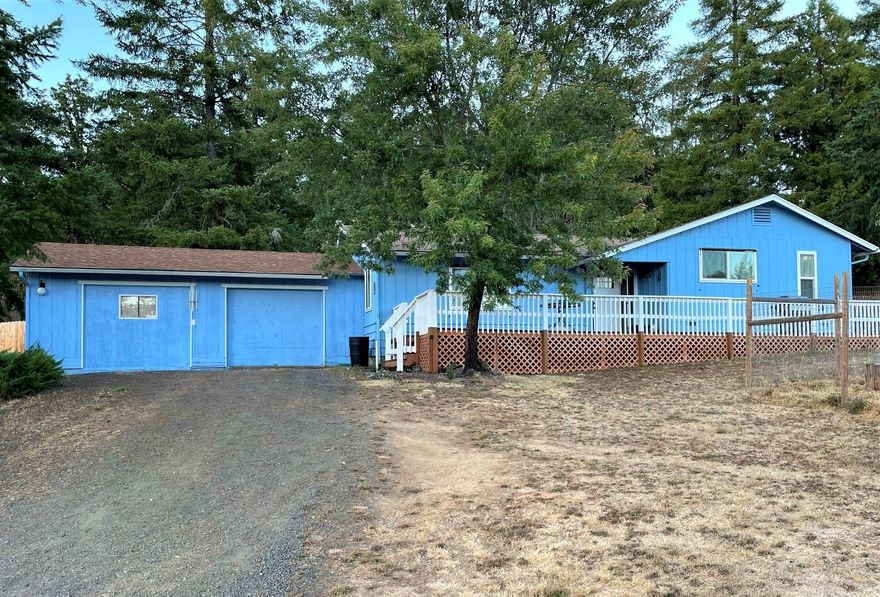 Country living close to everything in Roseburg! This beautifully updated 3 bd 2 bath home sits on 6.39 acres and boasts gorgeous views of the surrounding area. Wood stove, new flooring, light & bright windows inside with deck, fenced yard, & outbuildings outside. Wildlife, sunsets, and peaceful living are waiting for you.