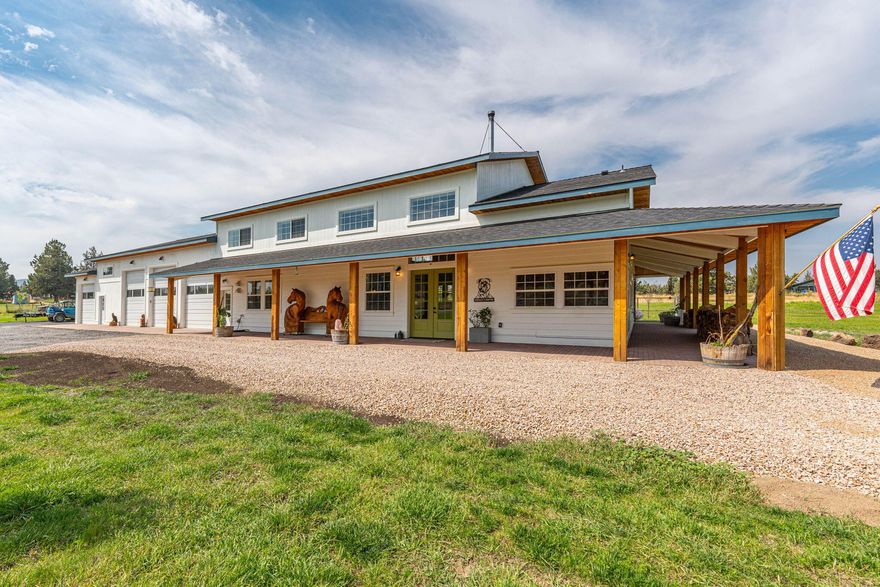 Come home to this luxurious property that is situated on 4.83 acres with 4.64 acres of irrigation rights. This stunning property offers 3,140 square feet of living space, 5 bedrooms (double master), 4 bathrooms and an office. Featuring upper-level mountain views, 2x8 insulated walls, and an open floor plan this home is ideal for both everyday living and entertaining. The kitchen is a chef's delight, with solid surface countertops and a large center island. A unique highlight of this home is the small secret room—perfect for a hidden office or a spot to house your most precious belongings. Project away in the extra-large 4 bay, 5 door garage/shop, which include 2 RV bays and built in cabinets. There's plenty of room to roam, offering endless possibilities for animals, gardening, outdoor activities, or simply savoring the tranquility of your private oasis. Don't miss this rare opportunity to own a home that combines modern luxury with boundless space.