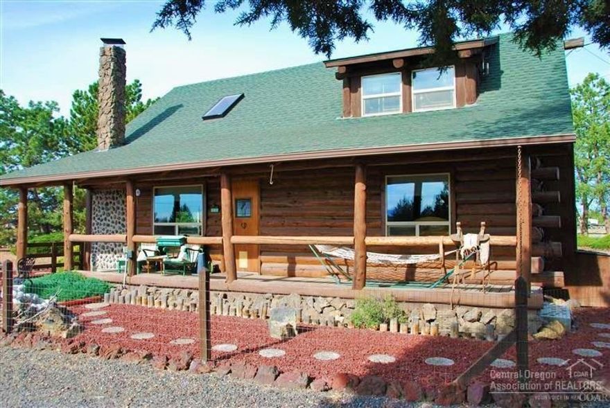 Charming Country Log Home with hobby/craft area in garage, Stable and Large Shop. Enjoy the glow of gorgeous pine logs and unique staircase. Just a minute or two from the entrance of Crooked River Ranch. Perfect spot for horses and hobbyists with a huge shop that has overhang that includes side storage for boats, RV's etc and a small stable. Fenced and Cross-fenced, this home includes a studio for guests or a perfect place to let your creative juices flow. All that Crooked River Ranch has to offer: golf, tennis, swimming, hiking, abundant wildlife & rich community life all while enjoying Cascade views.