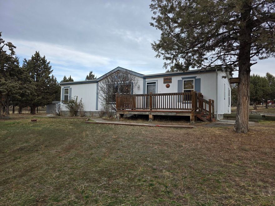 Well maintained manufactured home with addition and large workshop/garage all on 1.8 acres. Is this the property you have been waiting for? Home has been very well cared for with addition adding an extra area for den, family room or office. Large 24'x36' shop/garage has roll up doors, and is wired for 220. With additional storage space and covered RV parking on side and gravel driveway, there is  plenty of room for RV and toys. Lots of possibilities and opportunities to make it your own! Close to Prineville Reservoir and lots of BLM land. Come take a look today!