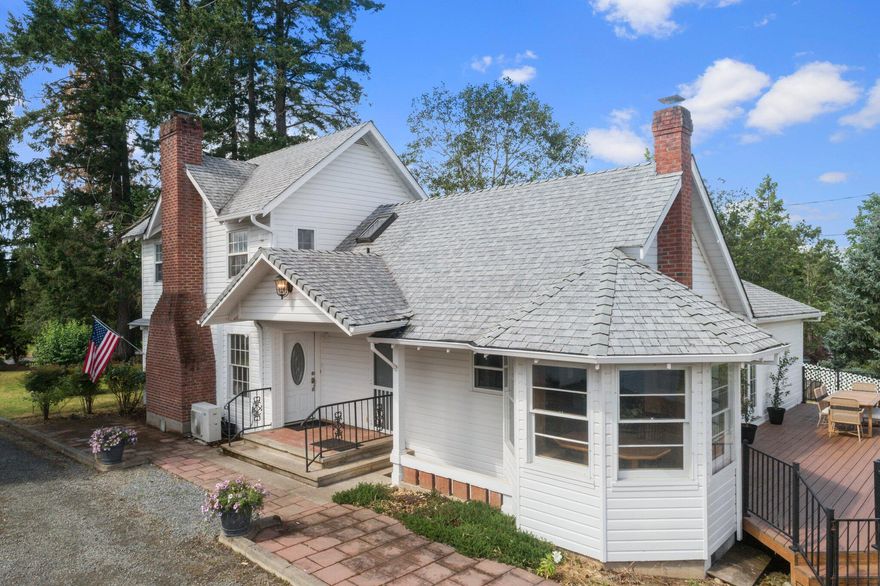 There aren't enough words to describe the charm of this 2-story farmhouse! This property also includes a 1504 sq ft guest house and a separate shop! The main home includes a formal living room designed around the wood burning fireplace, large family room, kitchen with amazing views from the breakfast nook, 4+ bedrooms plus 5 bathrooms and a large basement equipped with its own bathroom! Fresh paint inside and out of all buildings, 2 wells, irrigation rights, open arena for your horse and more! The guest house is the process of being renovated. Buyer has the option of purchasing it finished or having the ability to customize it themselves. Schedule your showing today!